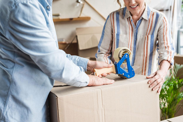 Albuquerque seniors packing a box